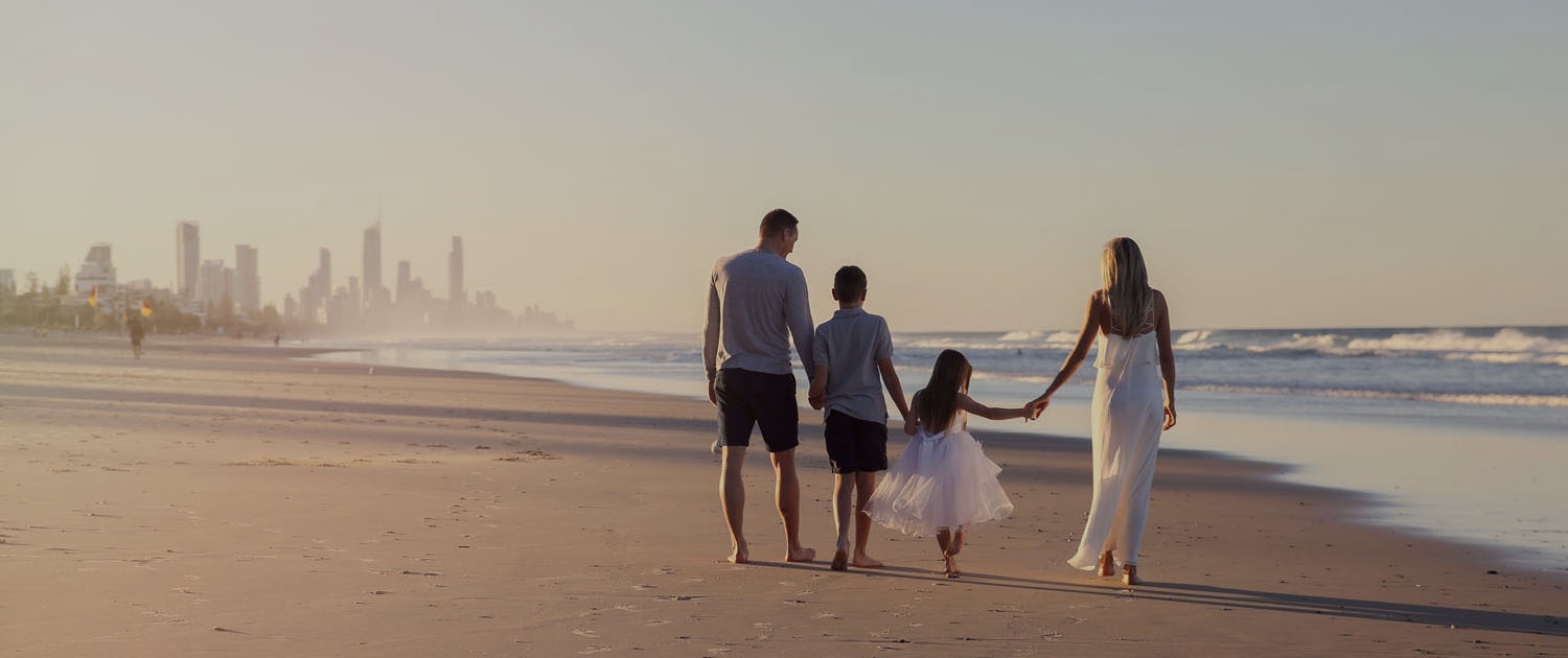 Family on the beach of Gold Coast by Precision Bookkeeping and HR